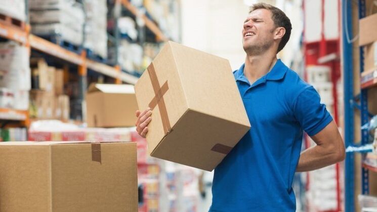 bolečine v hrbtu pri dvigovanju uteži